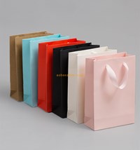 Wholesale custom beautiful printing reusable luxury brand paper bag for packing shopping gift